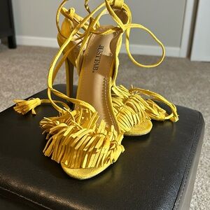 Yellow lace up sandals with fringe